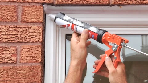 Sealant for window protection Stock Footage 133617760