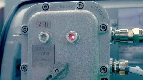 Sealed metal box with voltage switch and flashing LED indicator lamps Stock Footage 330901978