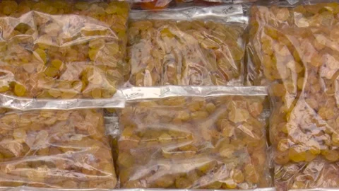 Sealed Raisins in Plastic Pack Stock Footage 321465915