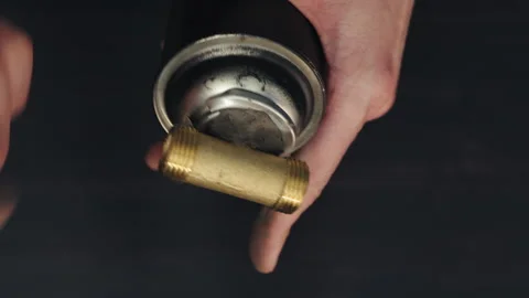 Sealing and Fixing: Applying Two-Component Adhesive to Plumbing Fitting Video stock 246737667