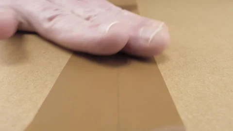 Sealing carton parcel Video stock 247731000