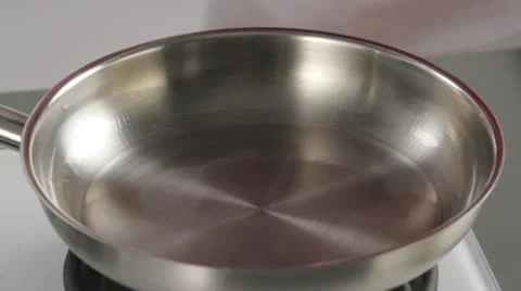 Sealing joint of beef in a frying pan Stock Footage 24663815