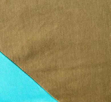 The seam between two different color on fabric Fotos Stock