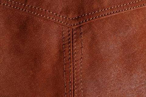 Seam in brown leather jacket Stock Photos