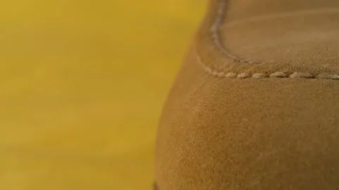 Seam on natural suede boot Stock Footage 140310288