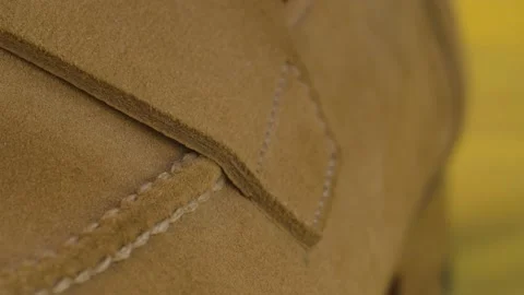 Seam on natural suede boot Video stock 140310507