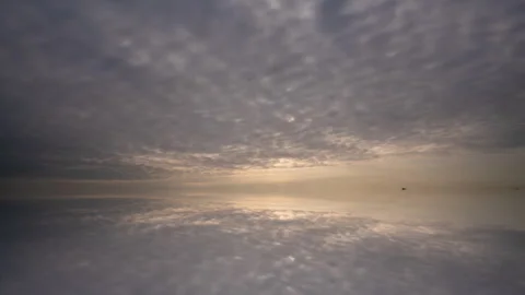 Seamless 4K Cloudscape Timelapse with Reflections Abstract Atmospheric Loop Stock Footage 306584133