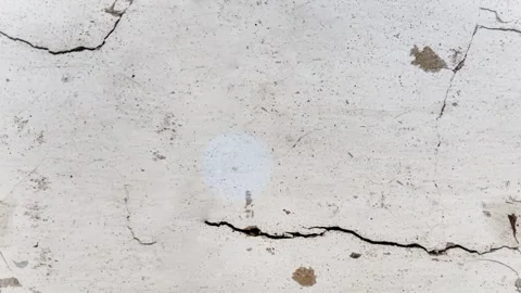 Seamless 4K looping vertical movement across a white plaster wall with a long 動画素材 344118495