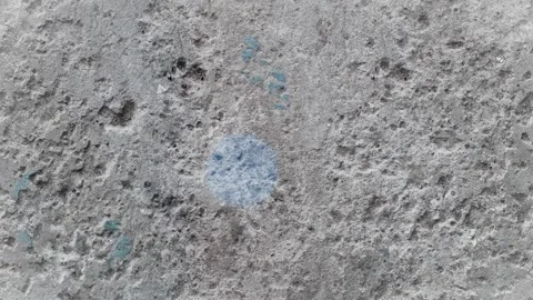 Seamless 4K looping vertical movement over a rough concrete wall texture with Stock Footage 344120475