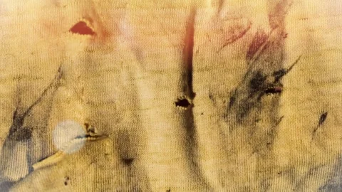 Seamless 4K looping vertical movement across a dirty yellow painted surface with Stock Footage 344121909
