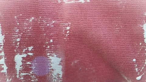 Seamless 4K looping vertical movement over a faded red painted surface with 動画素材 344125486