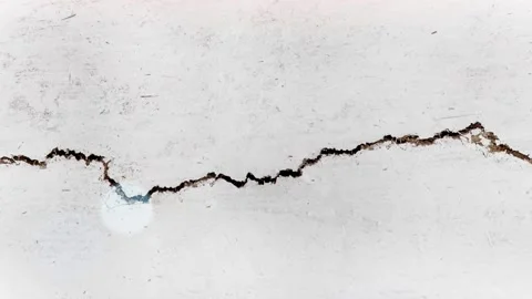 Seamless 4K looping vertical movement across a white concrete wall with a long Vídeo Stock 344125911