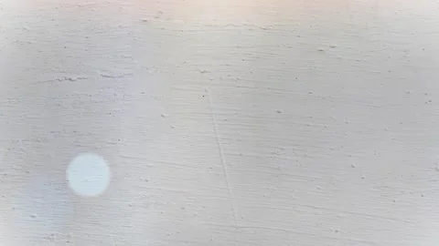 Seamless 4K looping vertical movement across a smooth light gray painted wall Vídeo Stock 344126021