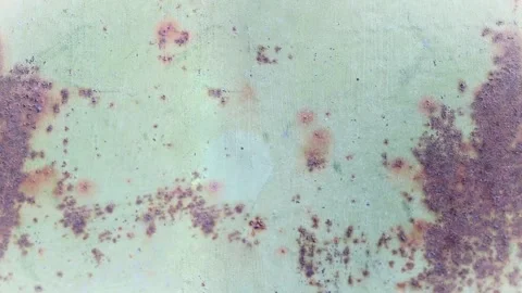 Seamless 4K looping vertical movement over a weathered green painted wall with Vídeo Stock 344126029