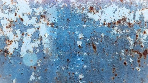 Seamless 4K looping vertical movement across weathered blue painted metal with 動画素材 344126197