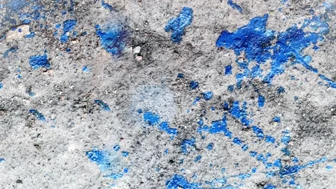 Seamless 4K looping vertical movement across a rough concrete surface with vivid 動画素材 344126236