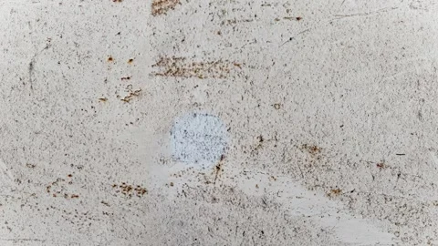 Seamless 4K looping vertical movement across a light concrete wall with fine 動画素材 344126961