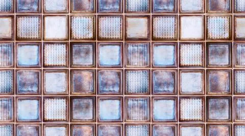 Seamless abstract textured pattern background of transparent multicolor glass Foto stock