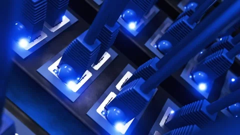 Seamless animation. Close-up of a modern internet switch with connected Ethernet Stock Footage 317447724