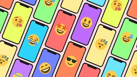 Seamless Animation of a Pattern made of smartphones and emoji emoticons. Stock Footage 84676843