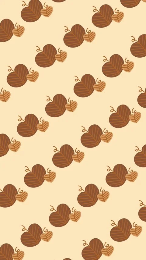 Seamless autumn pattern of heart shaped leaves warm beige background animation Stock Footage 342142363