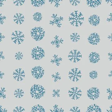 Seamless background of hand drawn snowflakes Illustrazione stock