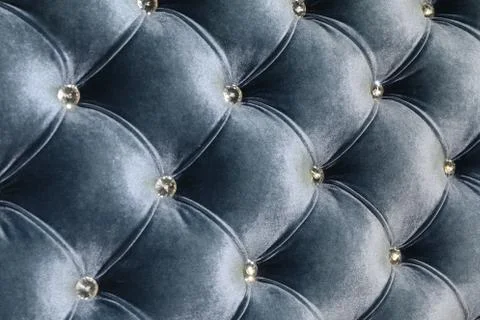 Seamless background texture close-up blue fabric with crystal detail on furni Stock Photos