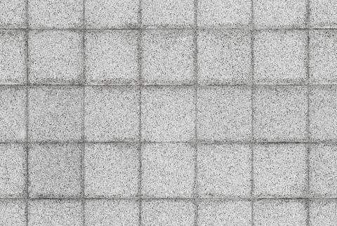 Seamless background texture of gray stone tiling on the wall Stock Photos