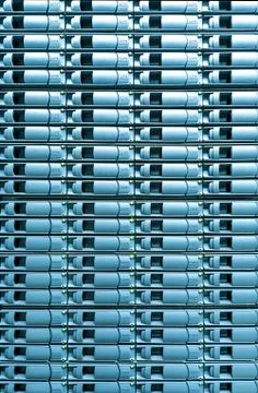 Seamless blue background of server disk storage. Stock Photos
