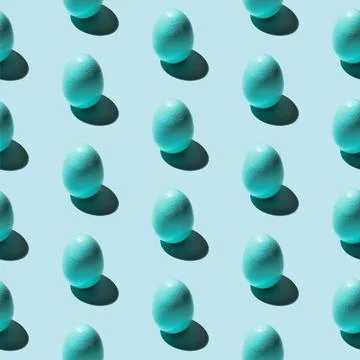 Seamless blue pattern with shadow. Easter minimalism with a painted egg. Stock Photos
