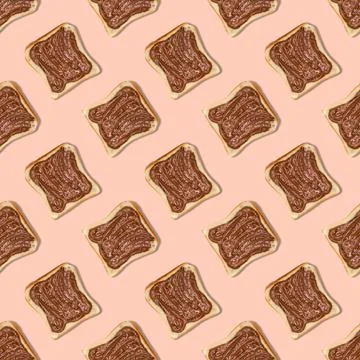 Seamless bread pattern with chocolate paste on a pink background Stock Photos