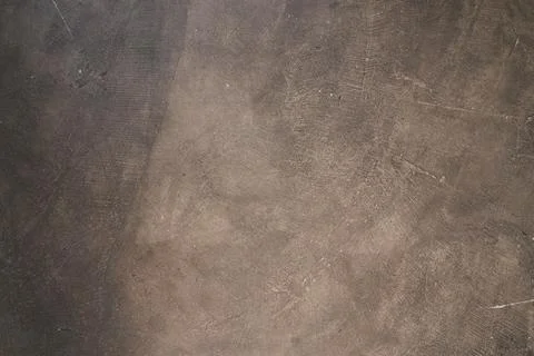 Seamless brown concrete texture. Stone wall background. Stock Photos