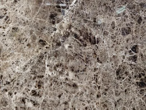 Seamless brown marble stone surface texture with natural white veins 库存照片