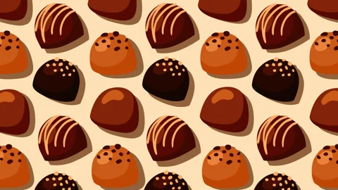 Seamless Chocolate Bonbon Candy Pattern Background for Sweet Dessert Content 스톡 동영상 336532398