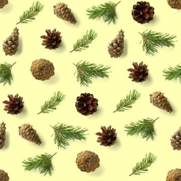 Seamless christmas pattern from Pine cones on yellow background. modern pine  Foto stock