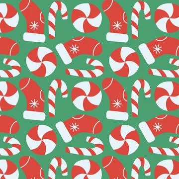 Seamless Christmas pattern with red socks and candy canes on green background Illustrazione stock
