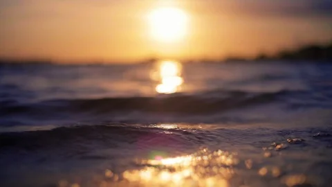 Seamless Cinemagraph Loop - Close up of waves from a lake during sunset Stock Footage 109176908