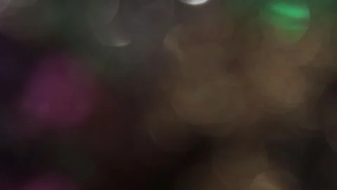 Seamless colored bokeh light movement at speed Vidéo 317459661