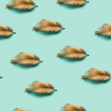 Seamless creative texture. Golden painted tropical Lip-shaped leaf on past... Stock Photos