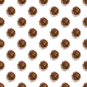Seamless cupcake pattern in chocolate on a white background Stock Photos