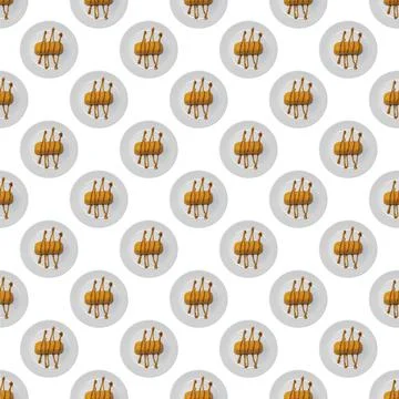 Seamless dessert pattern on a plate on a white background Photos