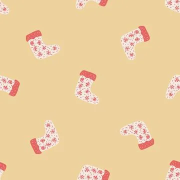 Seamless doodle pattern with simple red colored socks ornament. Light yellow  Illustrazione stock