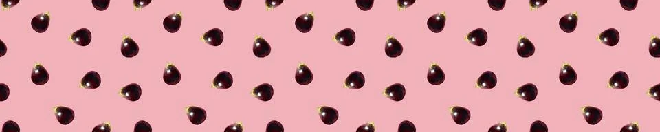 Seamless Eggplants Pattern on a pink background. Many Aubergines. Creative Stock-Fotos