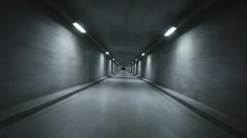 Seamless Flight Through a Dark Concrete Tunnel Stock Footage 314805433