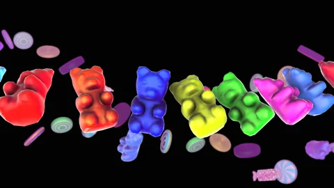 Seamless funny animation of striped mint hard candy cane dancing with a colorful Video stock 105946394