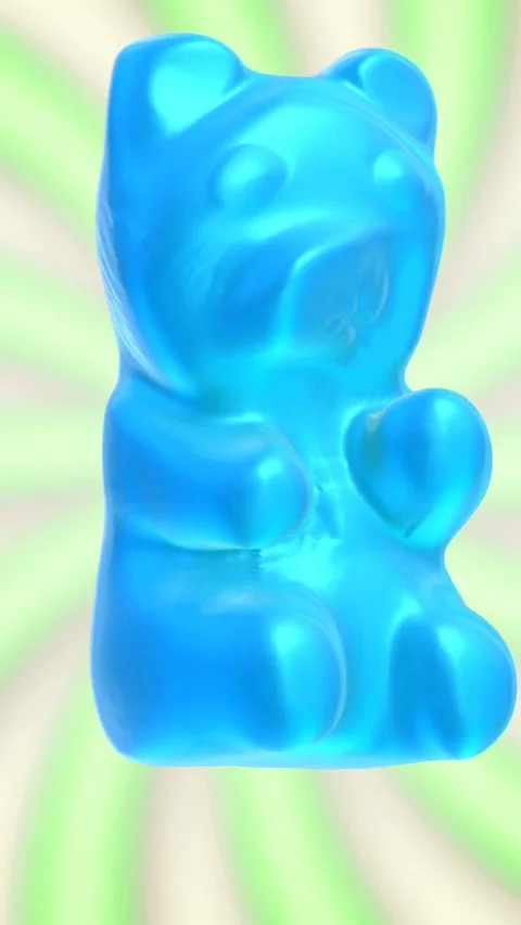 Seamless funny vertical video of candy gummy bears dancing with a colorful Stockbeeldmateriaal 309827369