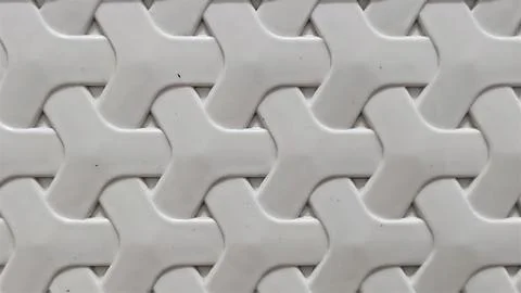 Seamless geometric pattern of interlocking concrete paving stones. Stock Photos