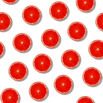Seamless grapefruit with shade pattern on white surface. Colorful fresh citru 스톡 사진