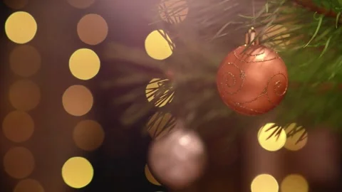 Seamless Holiday Loop with Red Bauble and Blinking Bokeh Lights Stockbeeldmateriaal 344391514