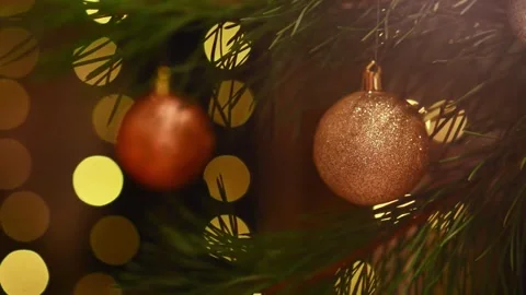 Seamless Holiday Loop with Two Baubles and Blinking Bokeh Lights Stock Footage 344391461
